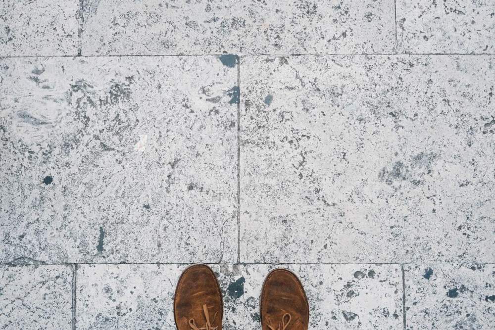 Looking down at your loafer shoes.